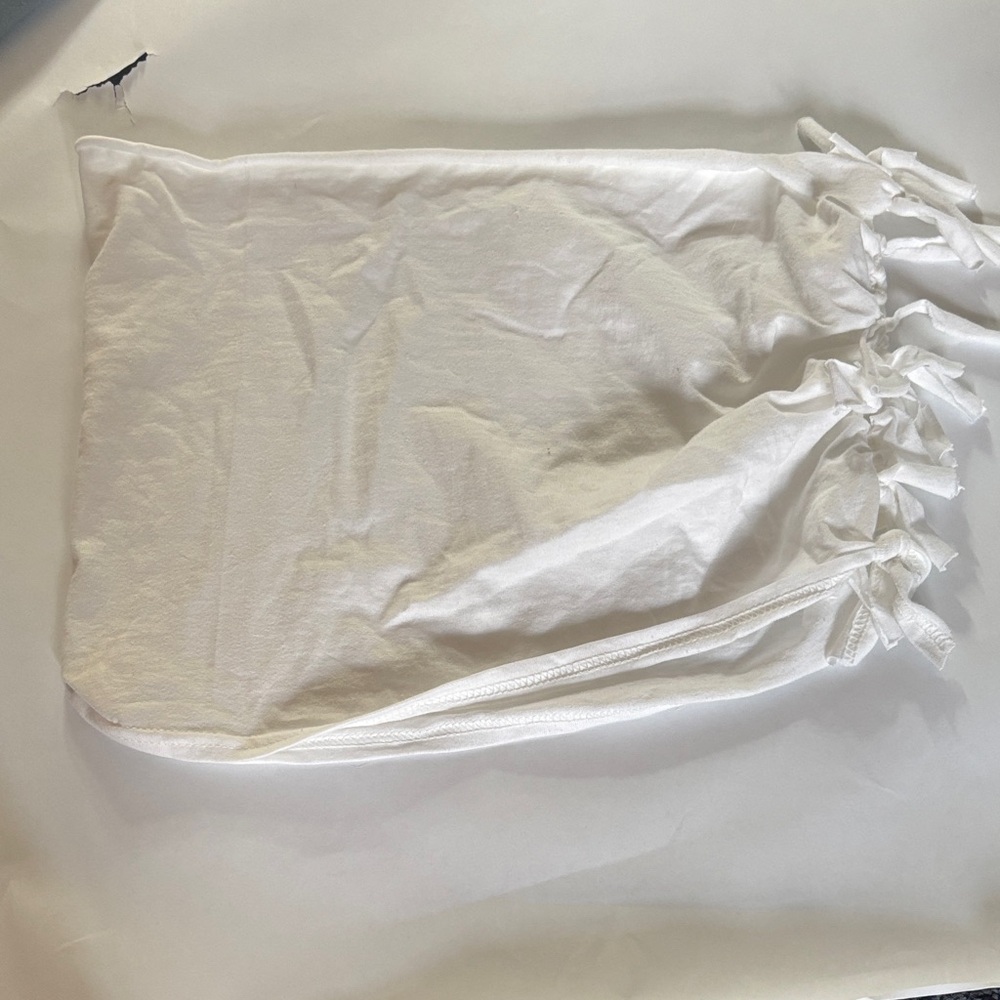 White type top with bows on the side